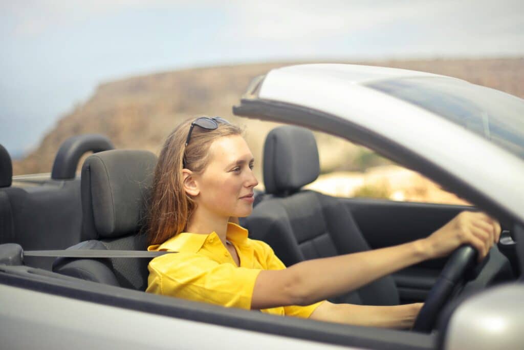 woman driving in car