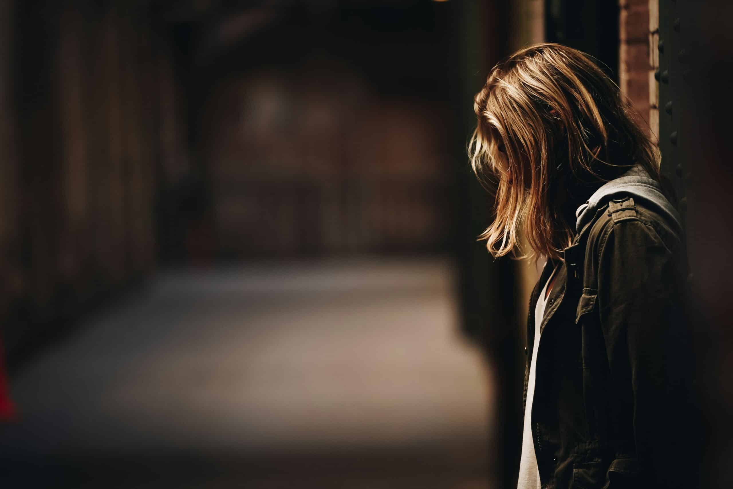 woman standing alone outside