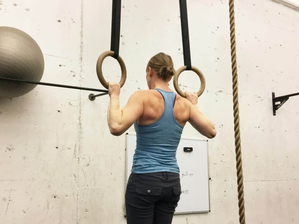 woman exercising at gym