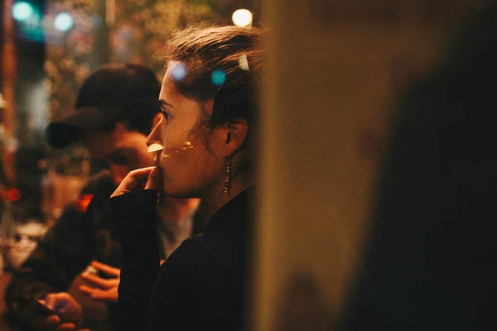 woman thinking at a bar