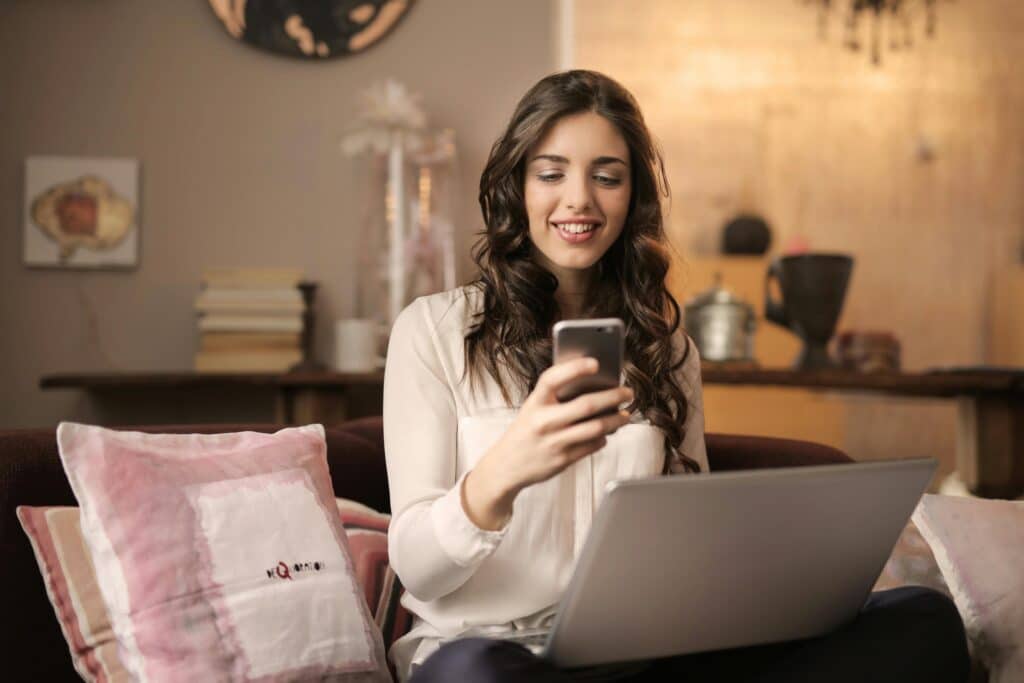 woman smiling on phone