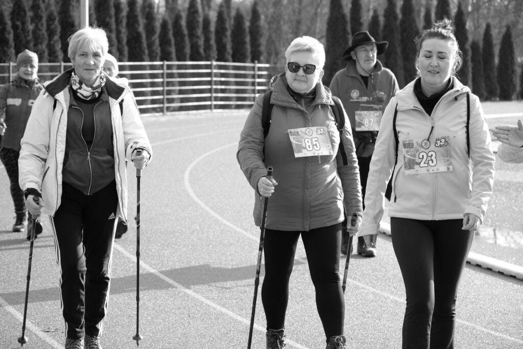 women walking around a track