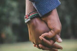 couple holding hands together