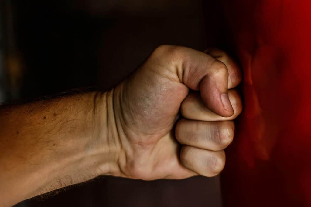 person punching a bag