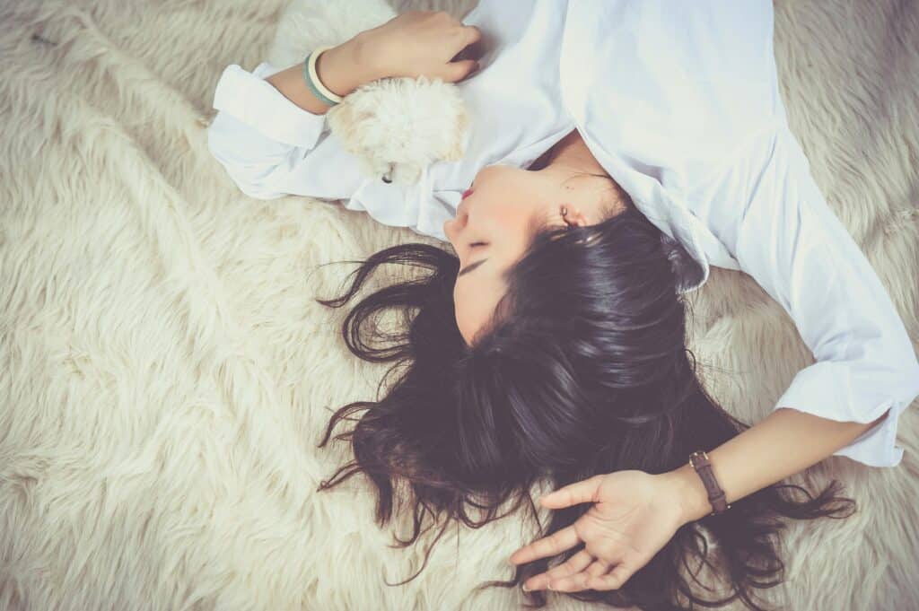 woman sleeping in her bed