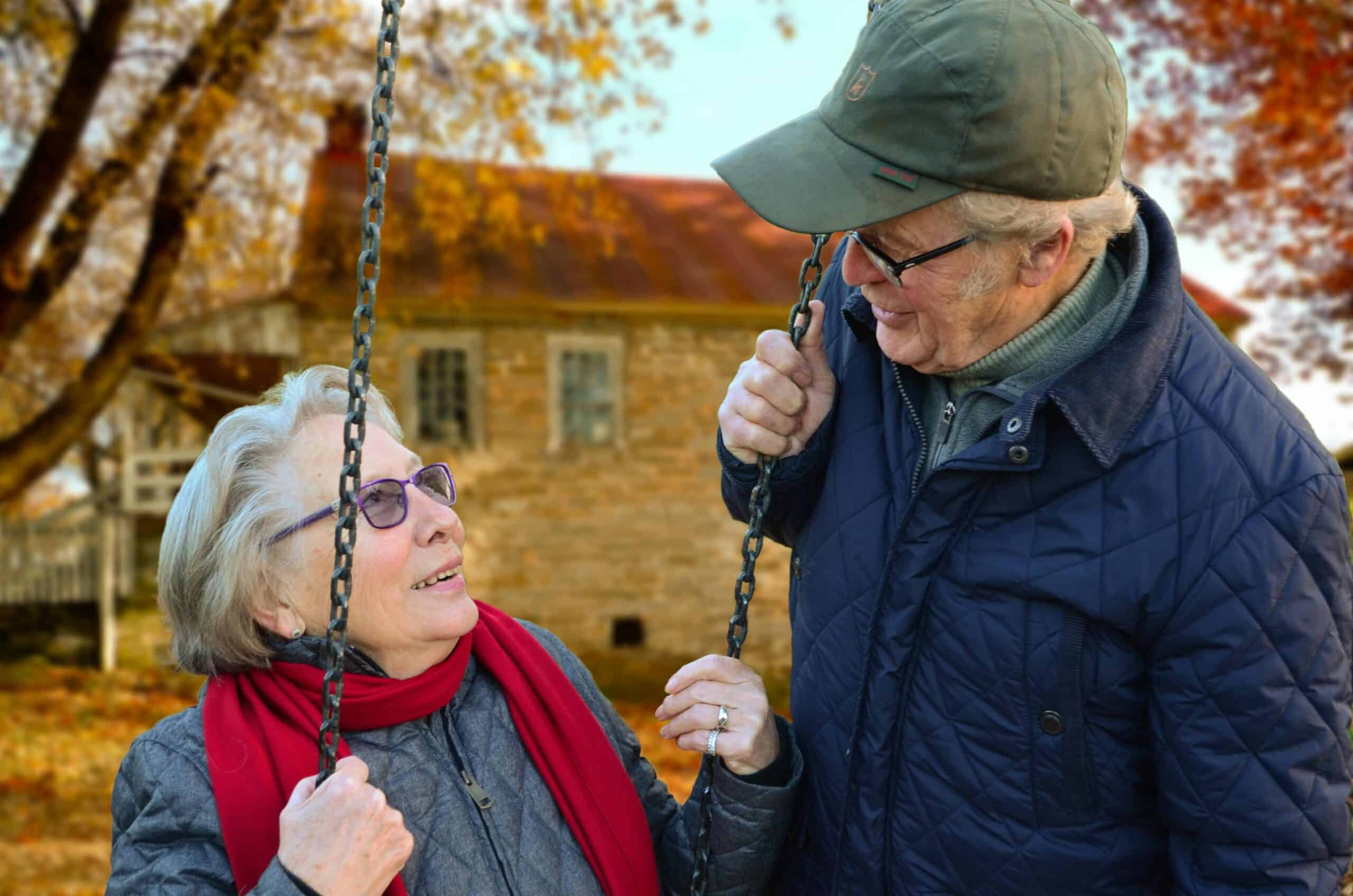 two elderly people enjoying each others