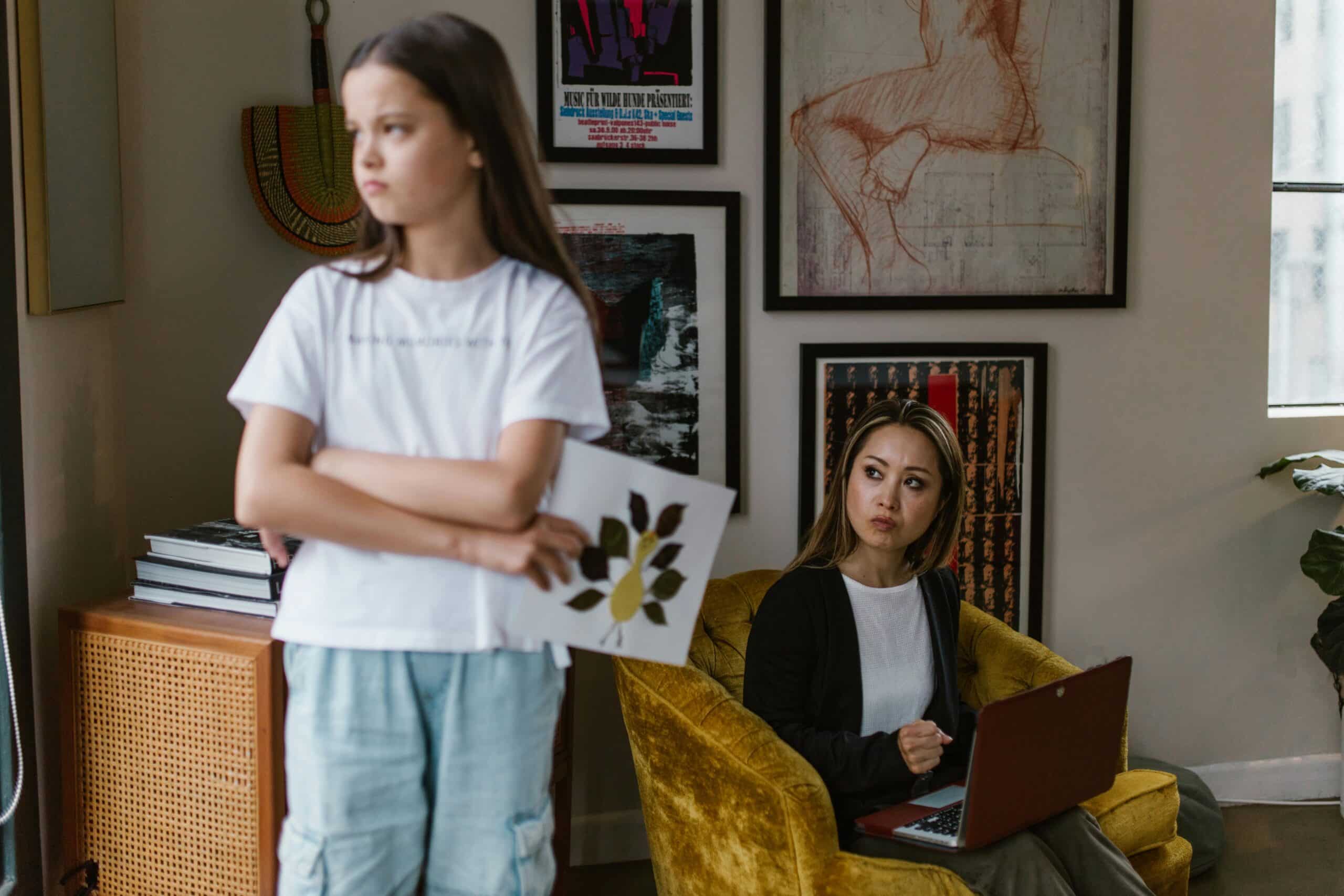 young girl ignoring her parents