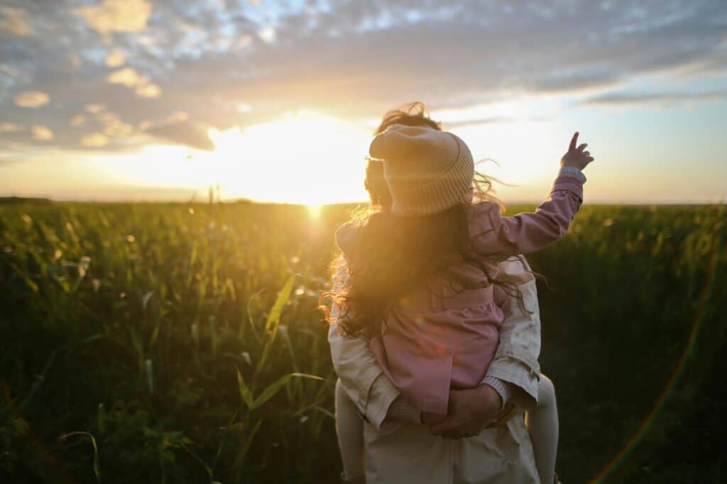 mother and daughter outside