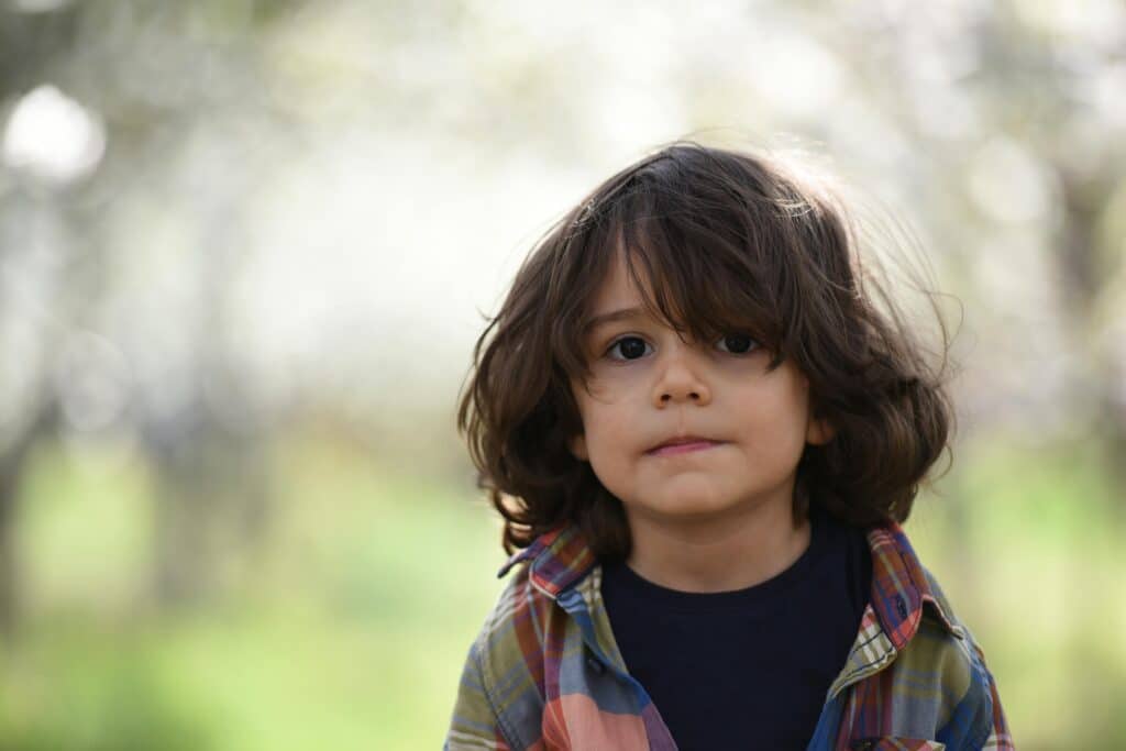 little boy smiling at camera