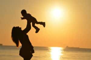 mother with her son at the beach